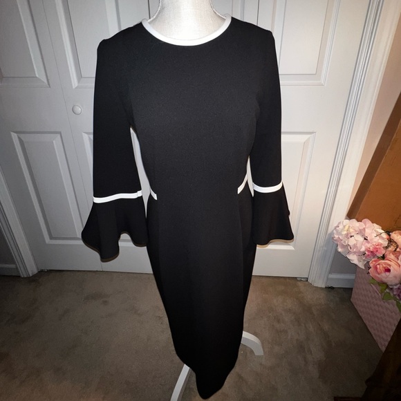 Calvin Klein Bell Sleeved Black w/ White Trim Dress. Size 6. Calvin Klein Bell Sleeved Black w/ White Trim Dress. Size 6.